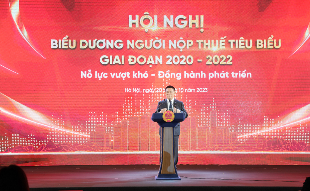 Bộ trưởng Bộ Tài chính Hồ Đức Phớc phát biểu tại Hội nghị.